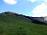 Aha, to je to za ta dnar. Planina Dovška Rožca in v ozadju vrh Dovške Babe.