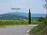 On the top of the climb we gaze upon our today's goal, Castelmonte. Huh, far away.