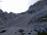 Na Ledinskem sedlu se odpre pogled v smer na Koroško Rinko. Tu srečava dvojico navdušencev nad slovensko planinsko potjo (transverzalo), ki sta jo nameravala obdelati v enem kosu. Kapo dol!
